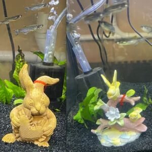 Local fish store stocks tank decor such as a ceramic bunny and an open mouth pink alligator