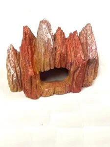 Aquarium tank accessory designed to look like a mountain cave, perfect for fish hiding spots.